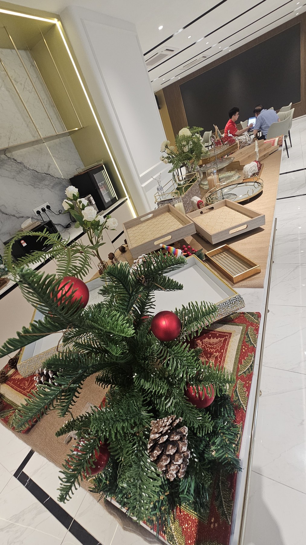 Christmas event catering setup with festive decorations and neatly arranged boxes