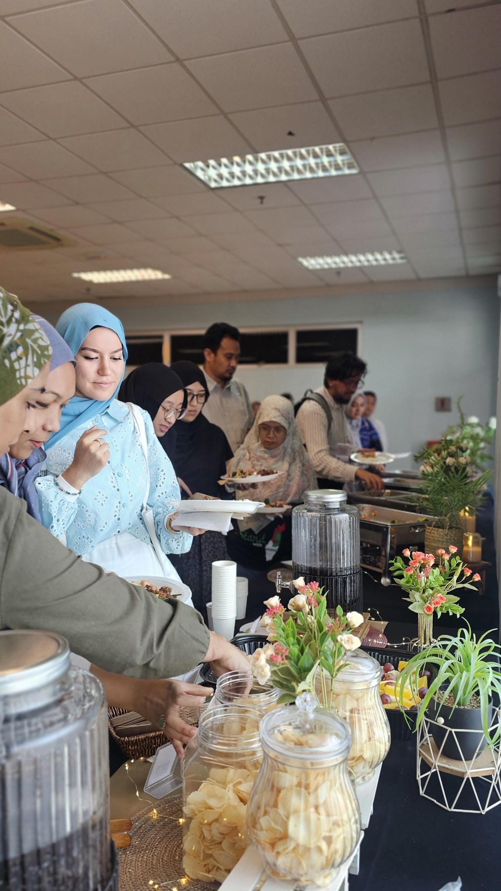 Guests serving themselves at a catered gathering