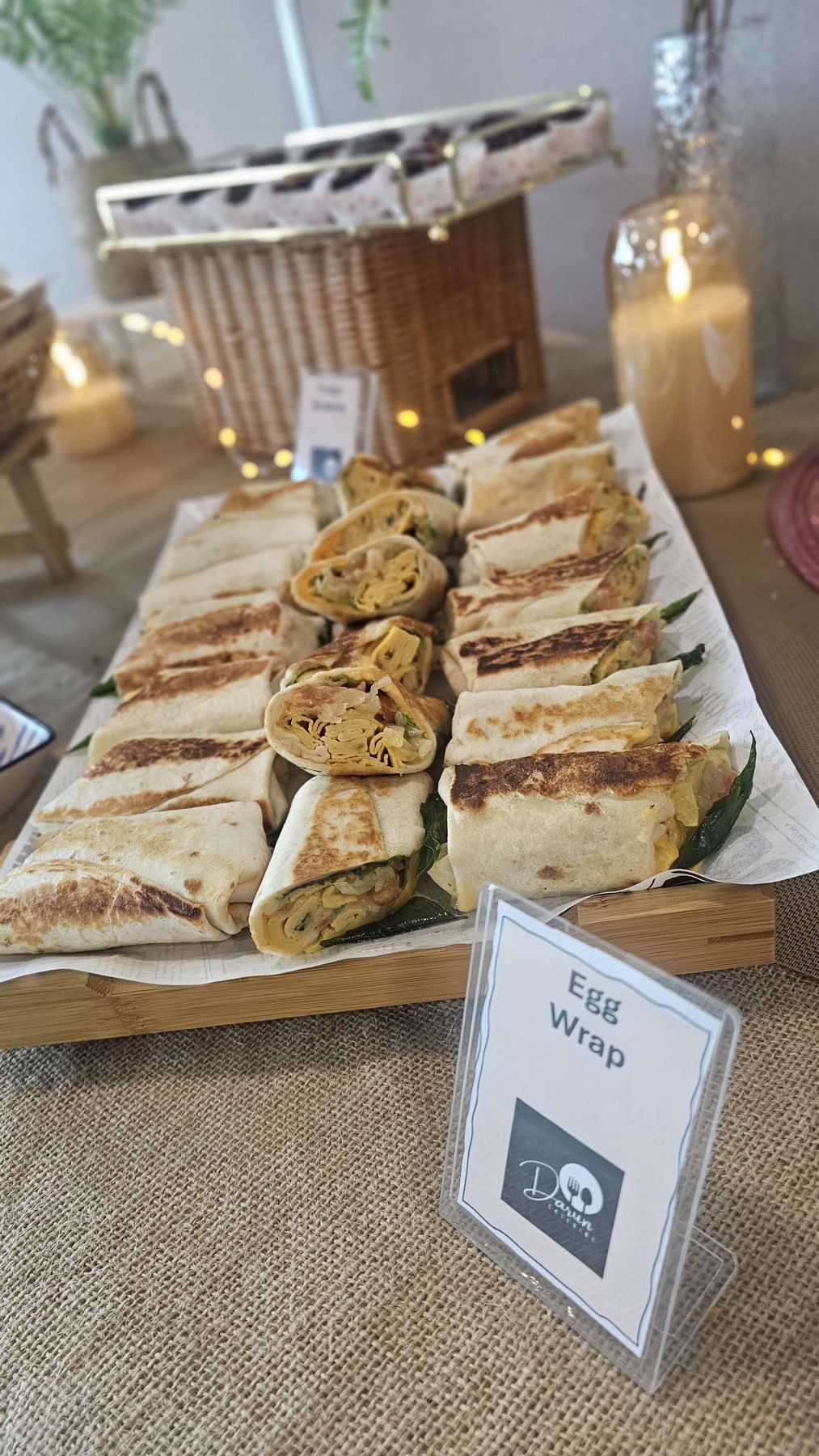Egg wraps arranged on a platter for refreshments