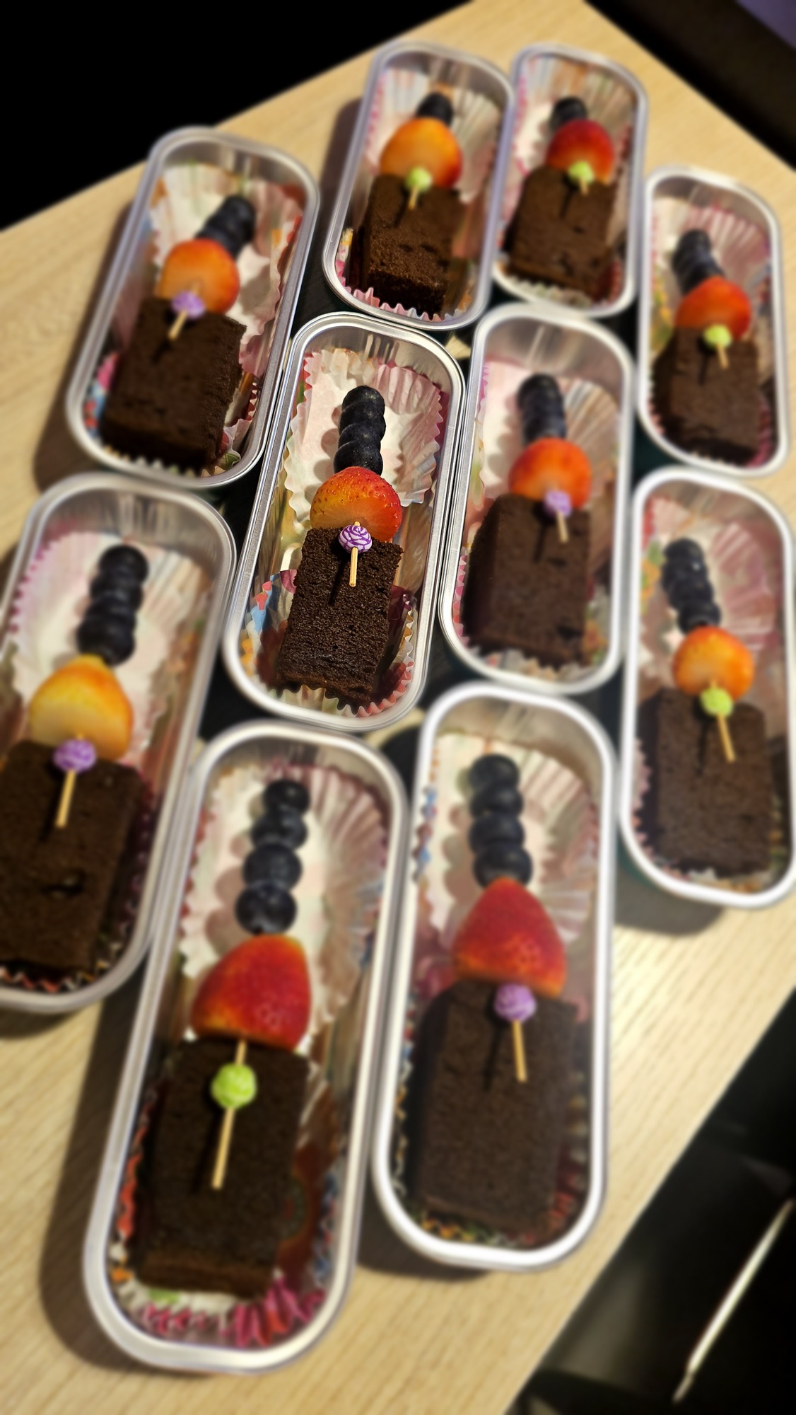 Individually presented chocolate desserts with fresh fruit